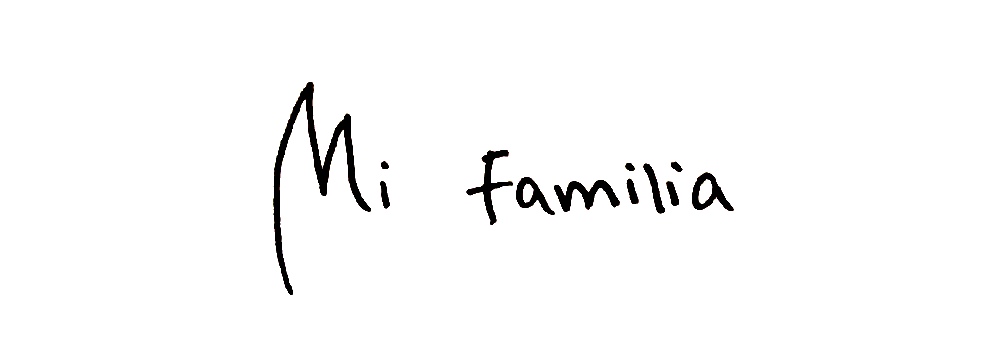 Handwritten text reading Mi Familia
